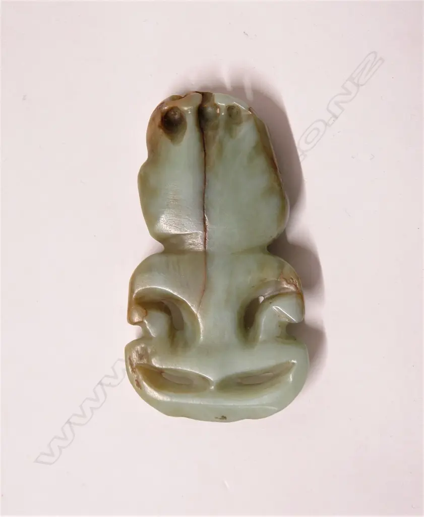 An uncommon pre-European Maori carved inunga pounamu hei tiki Image 1++