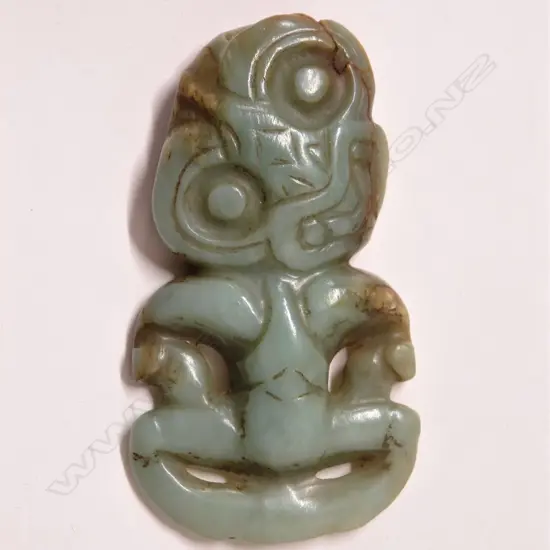 An uncommon pre-European Maori carved inunga pounamu hei tiki