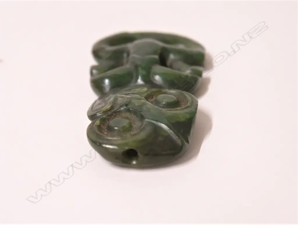 A pre-European Maori carved pounamu hei tiki Image 1++