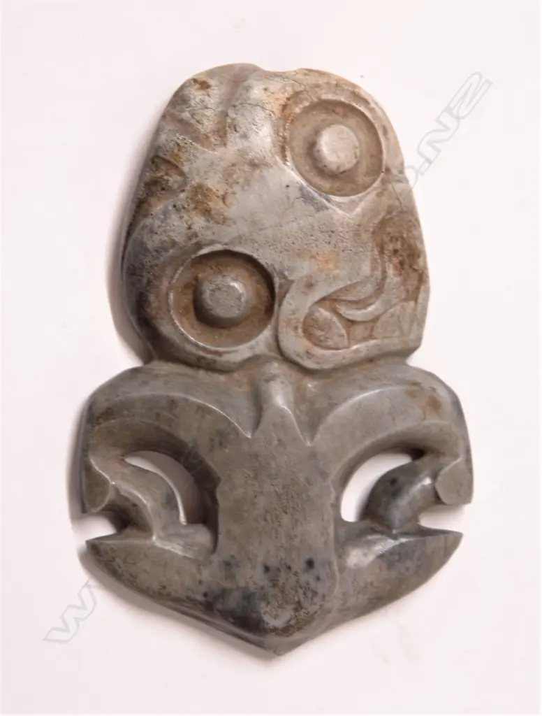 A large pre-European Maori carved pounamu damaged hei tiki Image 1++