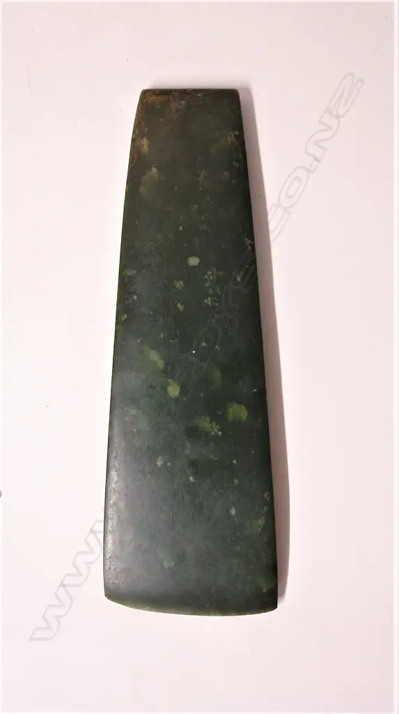 A large and impressive Maori contact period carved pounamu toki (adze blade) Image 1++