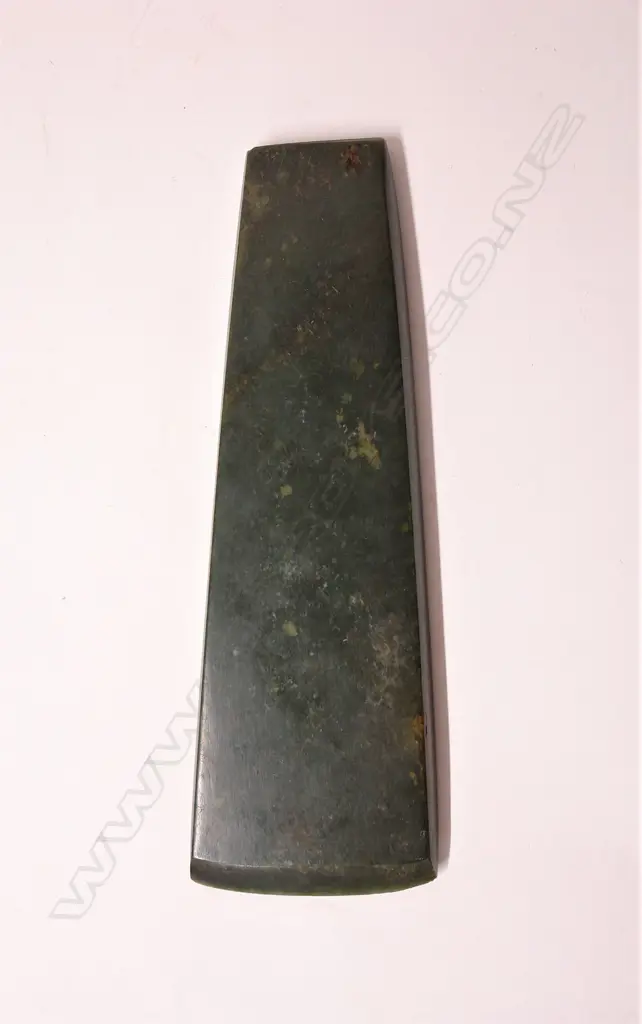 A large and impressive Maori contact period carved pounamu toki (adze blade) Image 1++