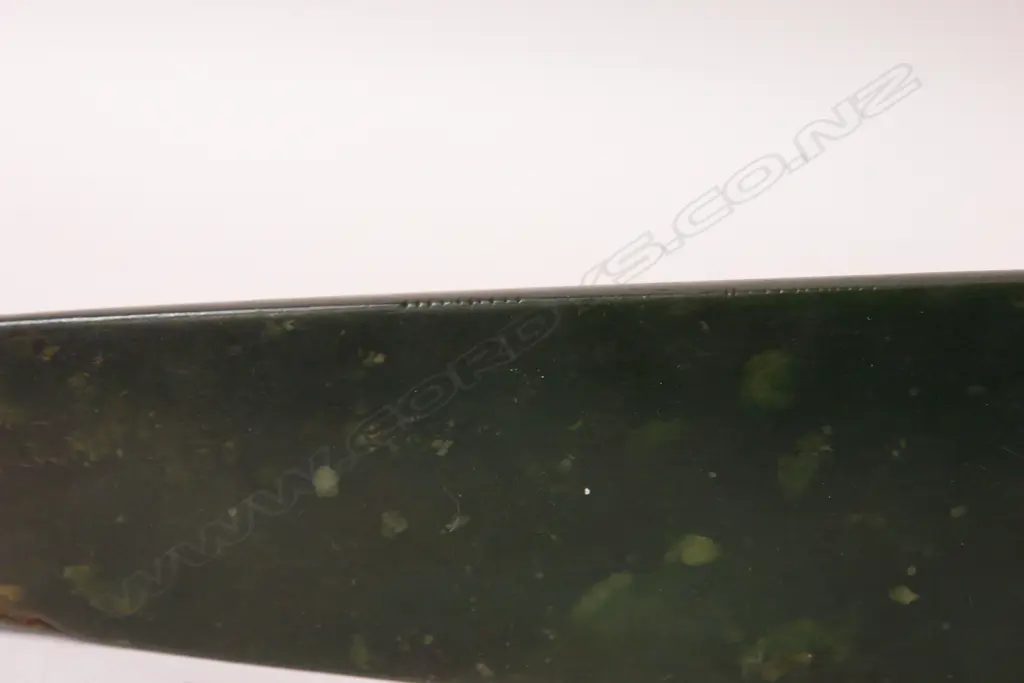 A large and impressive Maori contact period carved pounamu toki (adze blade) Image 1++