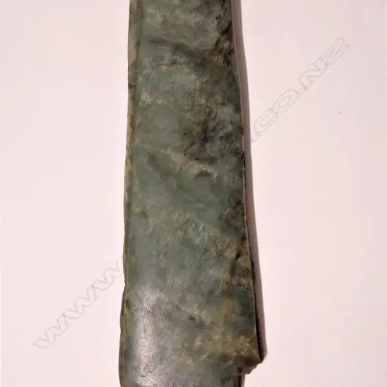 A pre-European Maori carved pounamu large toki (adze blade)