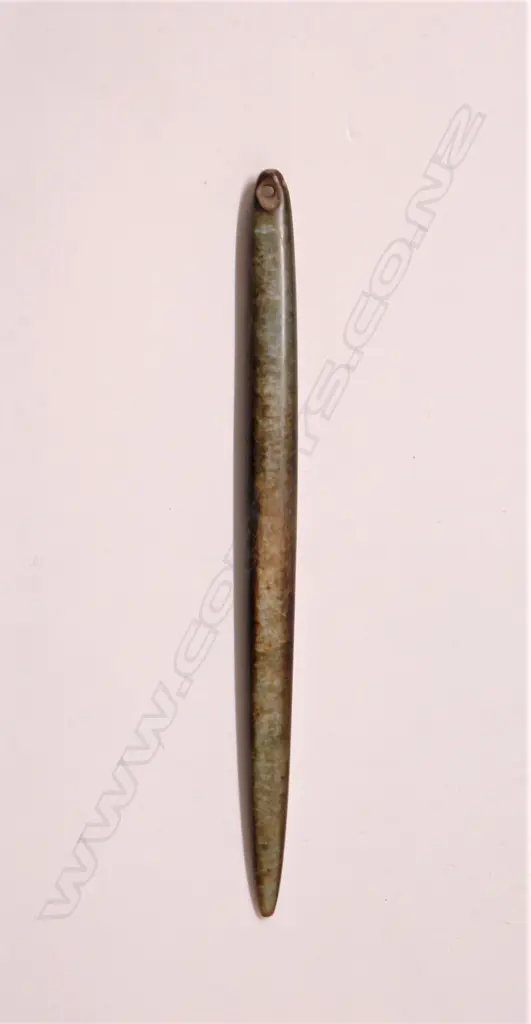 An old Maori carved pounamu (bowenite) fine and long kuru pendant Image 1++
