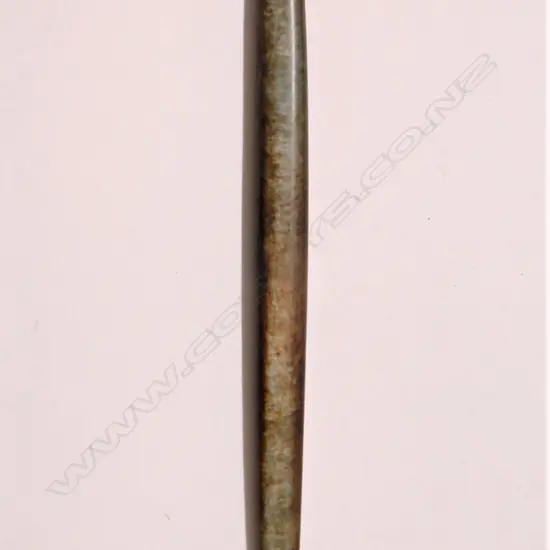 An old Maori carved pounamu (bowenite) fine and long kuru pendant