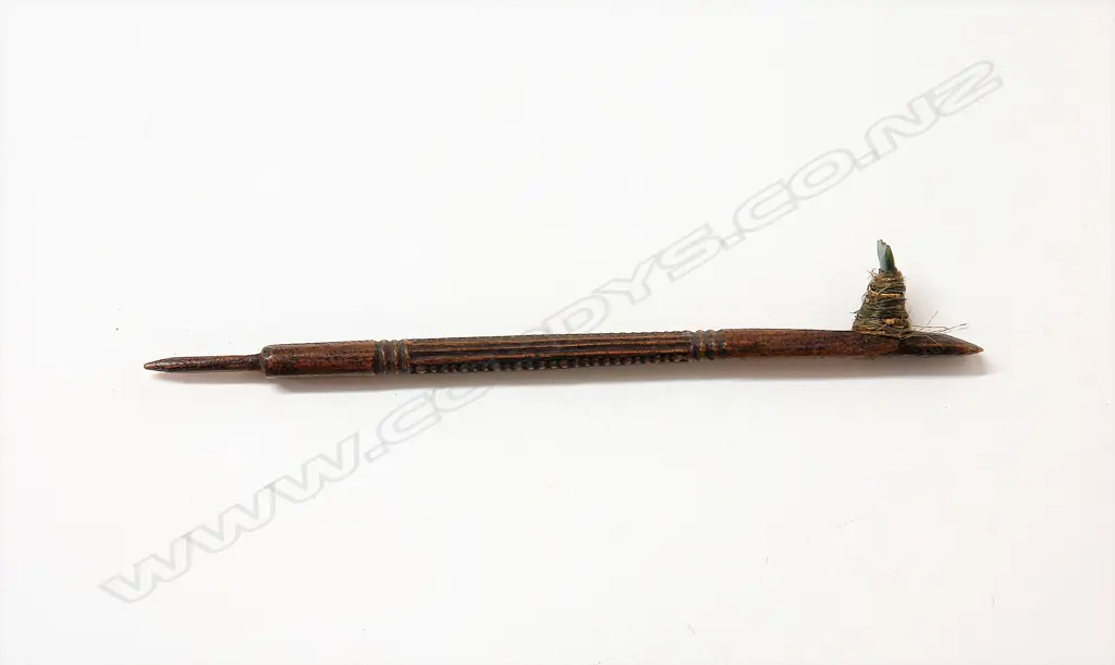 An old Maori uhi (chisel) Image 1++