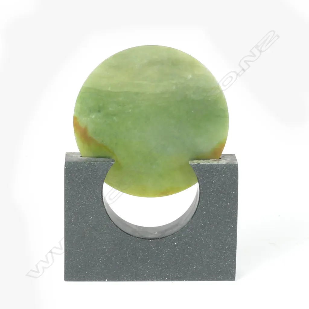 A contemporary pounamu disc in basalt stand by Richard Moore Image 1++