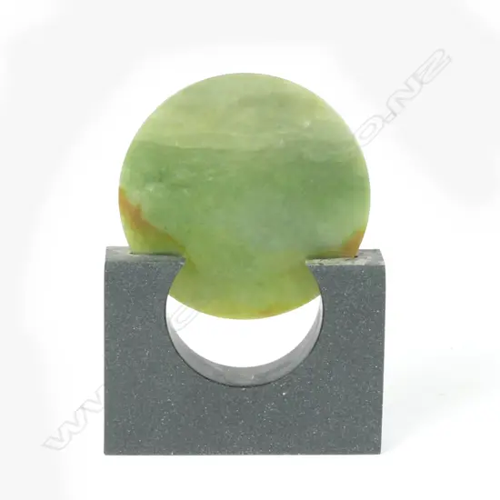 A contemporary pounamu disc in basalt stand by Richard Moore