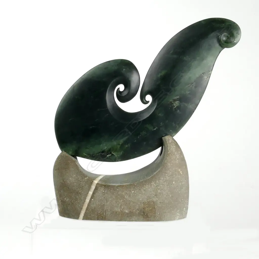 A contemporary pounamu matau sculpture by Richard Moore Image 1++