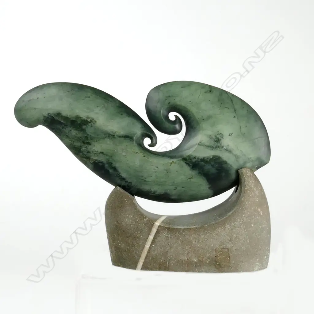 A contemporary pounamu matau sculpture by Richard Moore Image 1++