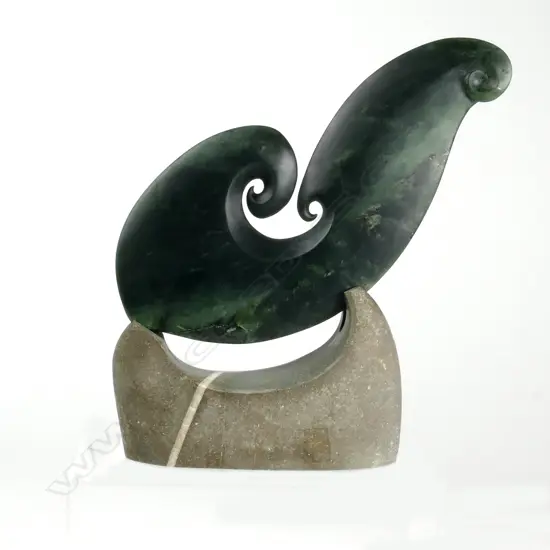 A contemporary pounamu matau sculpture by Richard Moore