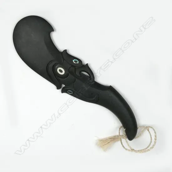 An Akapita Scully carved basalt wahaika sculpture