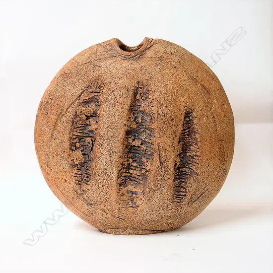 A Len Castle stoneware discoid vase