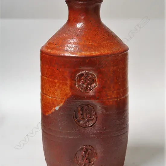 A Len Castle shino glazed bottle