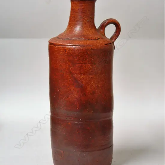 A Len Castle shino glazed bottle