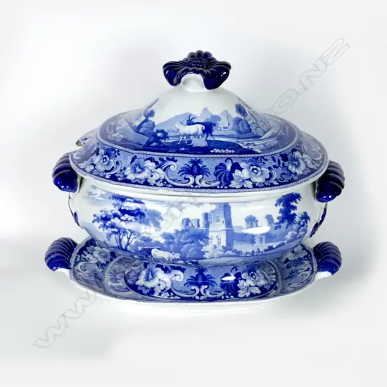 A 19thC blue and white soup tureen on stand