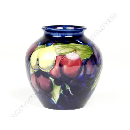 A limited edition Walter Moorcroft 'Wisteria Plum' vase