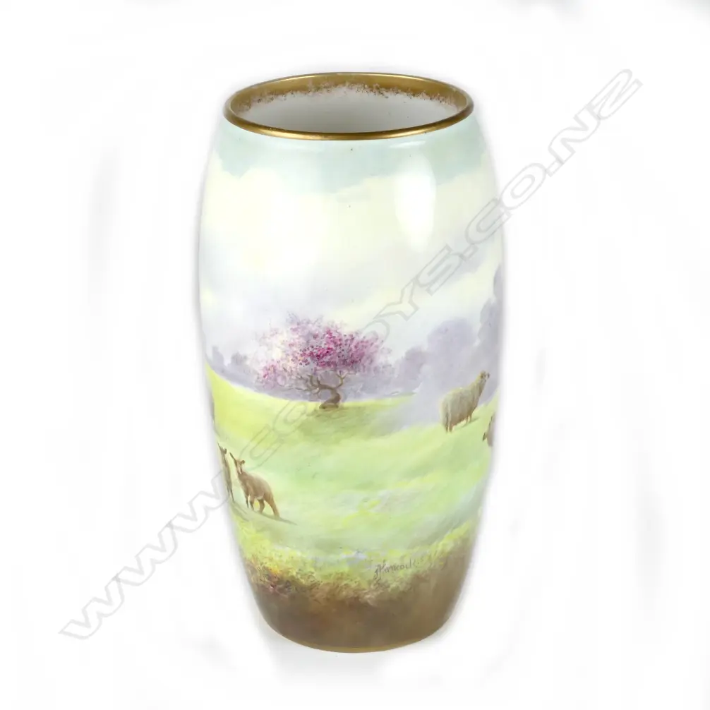 A Royal Doulton vase decorated with sheep in an extensive landscape Image 1++