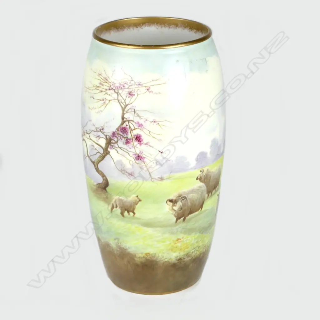 A Royal Doulton vase decorated with sheep in an extensive landscape Image 1++