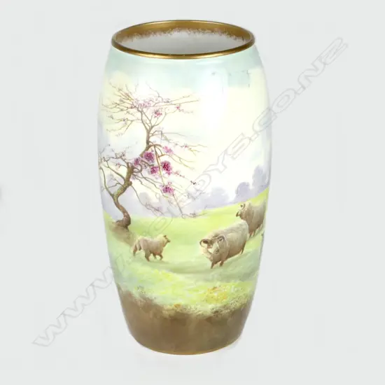 A Royal Doulton vase decorated with sheep in an extensive landscape