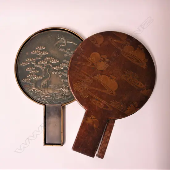 A 19thC Japanese Meiji bronze mirror in decorative lacquered case