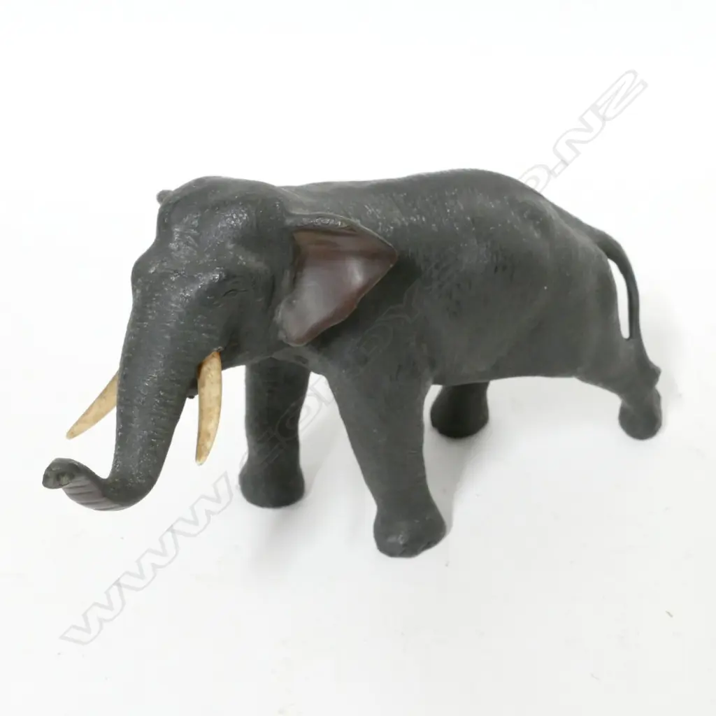 A Japanese Meiji period bronze standing elephant calf Image 1++