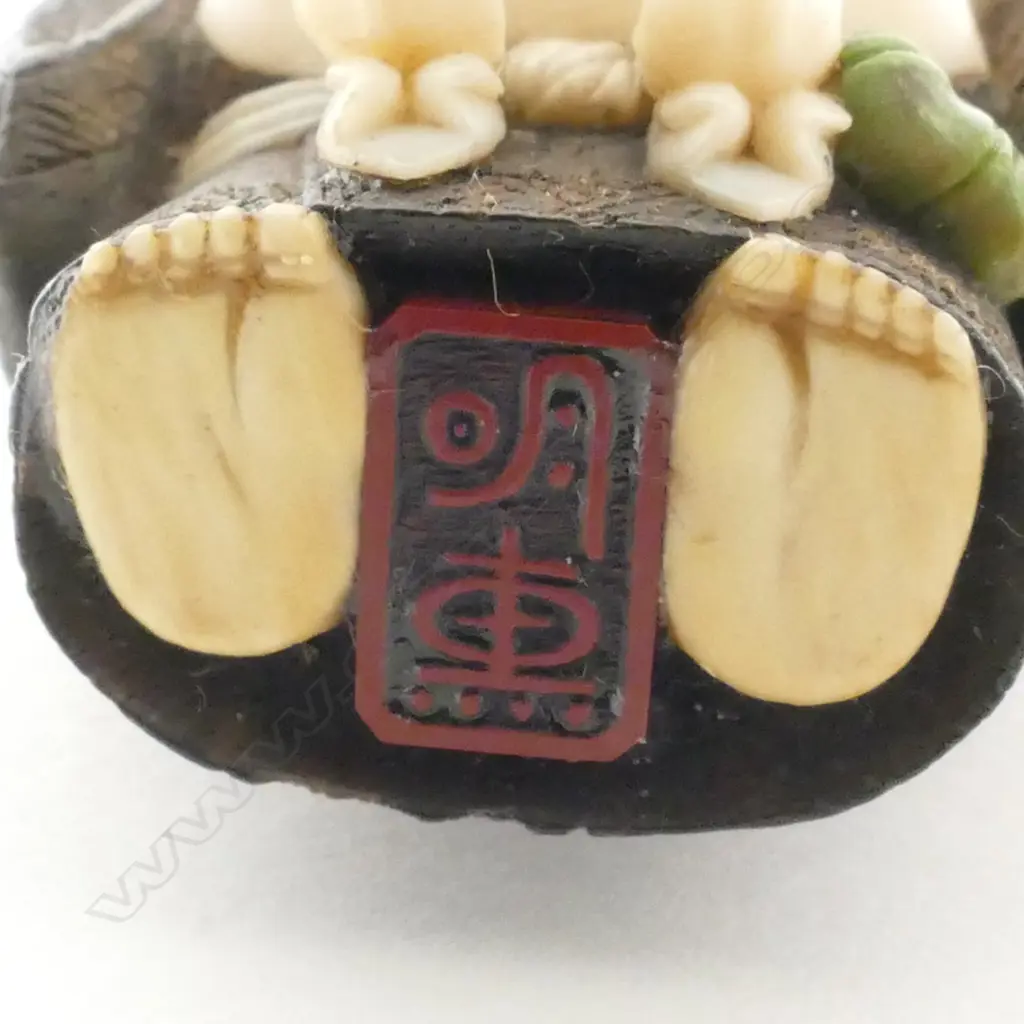 A good Tokyo school tagayasan wood and ivory netsuke of Hotei attributed to Suzuki Tôkoku [Bairyû] (1845-1913) Image 1++