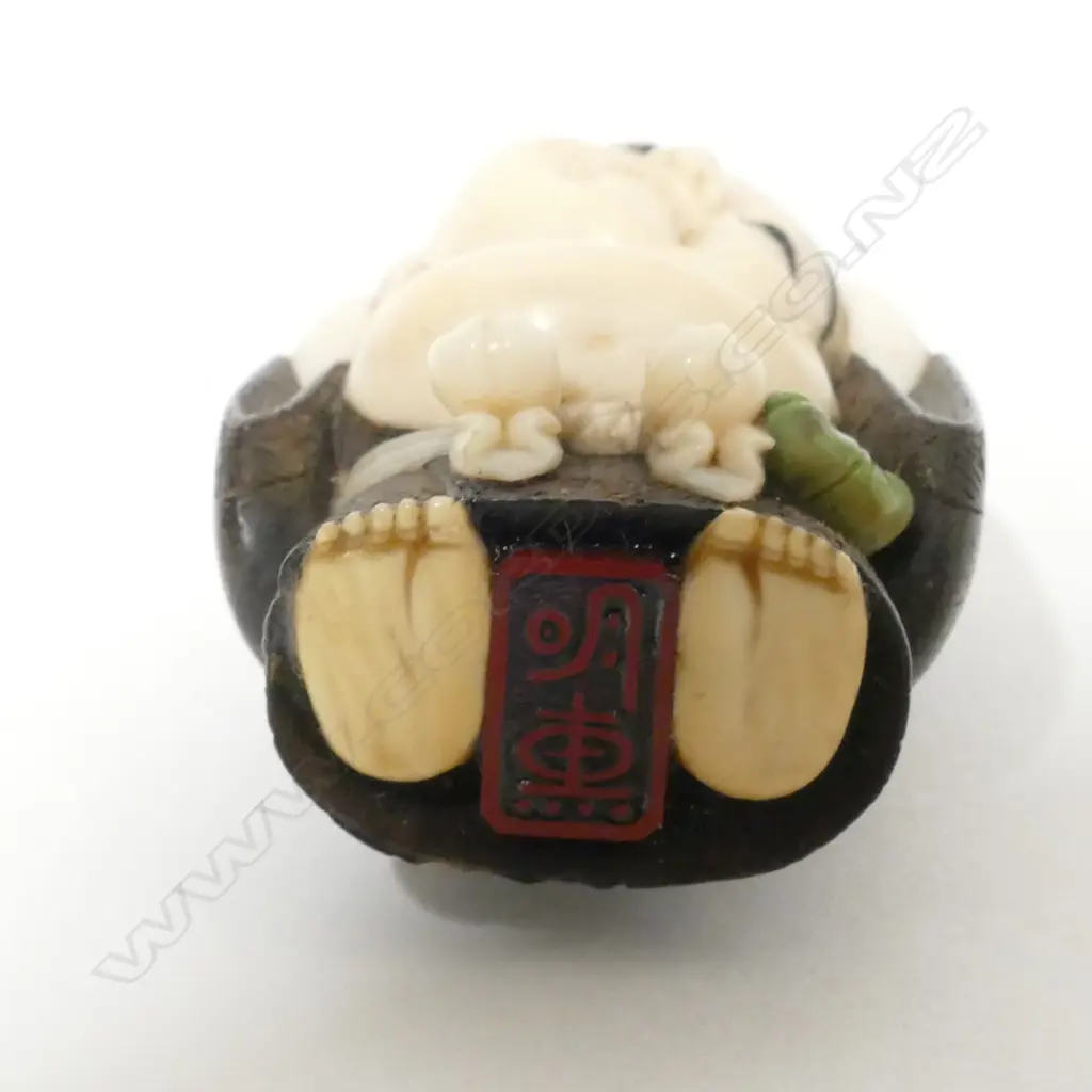 A good Tokyo school tagayasan wood and ivory netsuke of Hotei attributed to Suzuki Tôkoku [Bairyû] (1845-1913) Image 1++