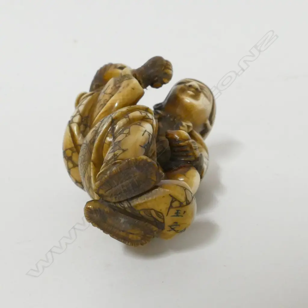 A Japanese small ivory okimono Image 1++