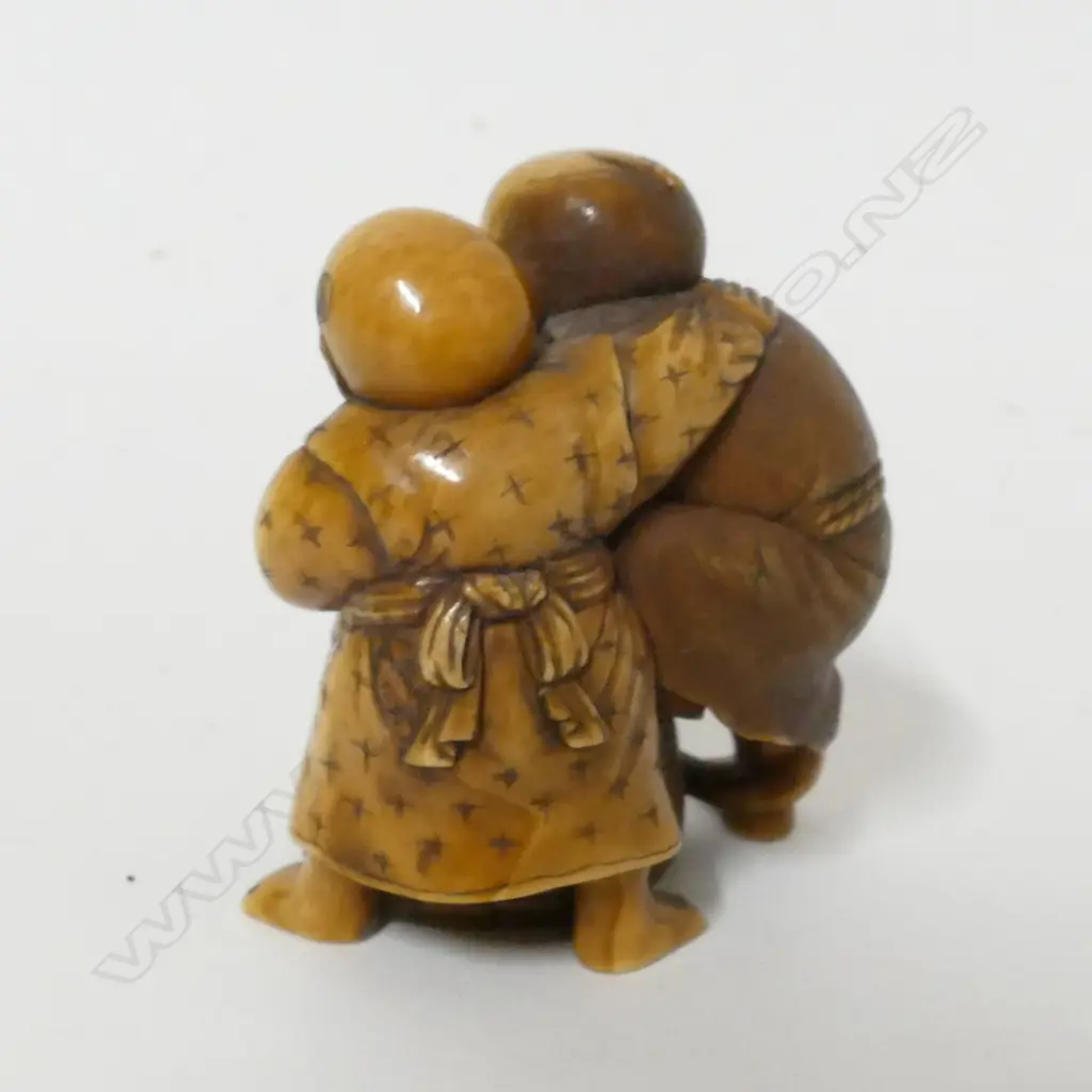 A small 19thC ivory okimono Image 1++