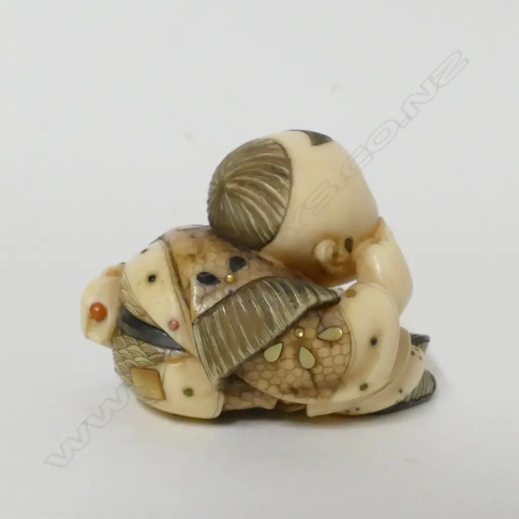 A good Tokyo school ivory and shibayama netsuke of a young boy Image 1++