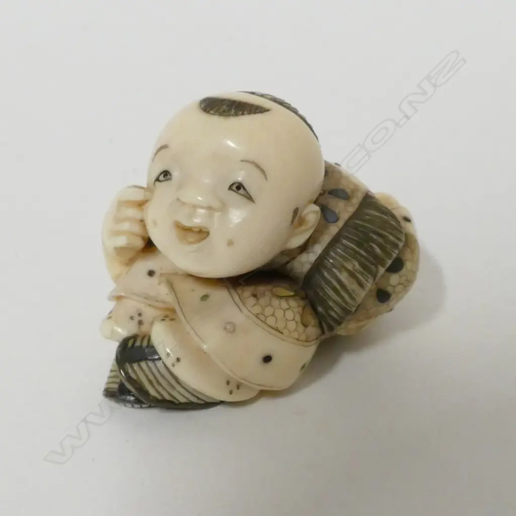 A good Tokyo school ivory and shibayama netsuke of a young boy Image 1++