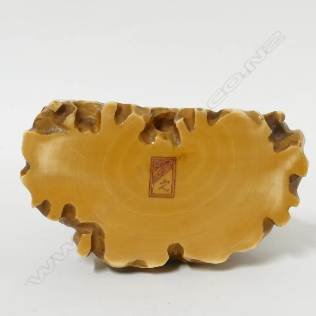 A 19thC ivory okimono of a man watering a horse Image 1++