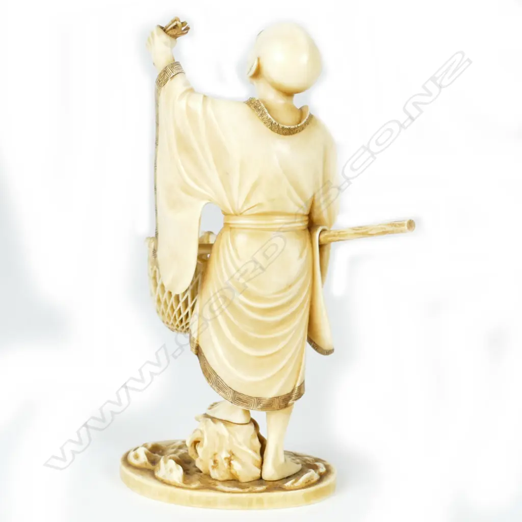 A fine Japanese Meiji period okimono of a fisherman Image 1++