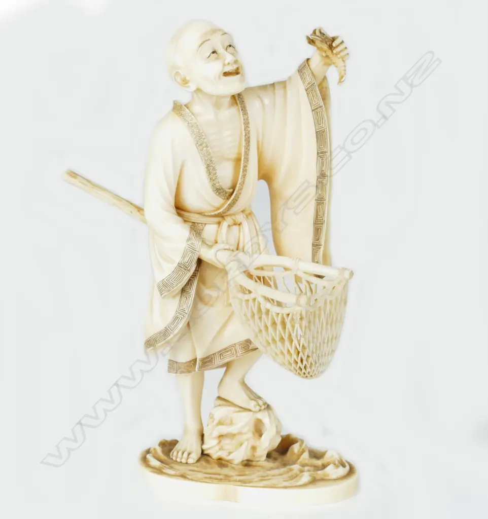 A fine Japanese Meiji period okimono of a fisherman Image 1++