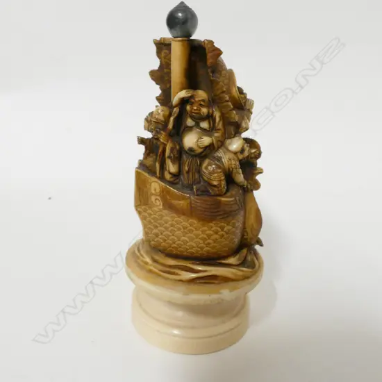 A Japanese Meiji period ivory okimono of the seven gods of fortune