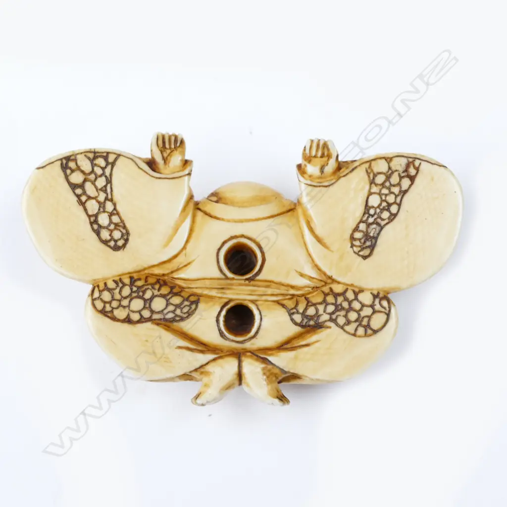 An ivory netsuke of Hotei Image 1++