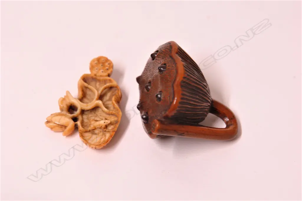 A 19thC Japanese boxwood netsuke and small ivory carving Image 1++