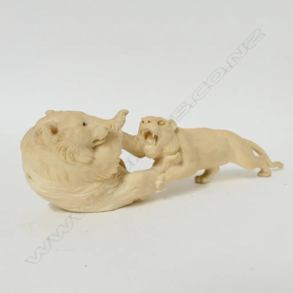 An old ivory carved figure group Image 1++