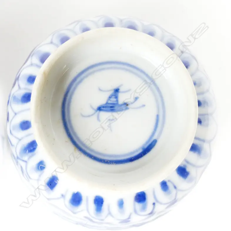 A pair of small fine quality late 19th/early 20th Century Chinese blue and white porcelain stem cups Image 1++