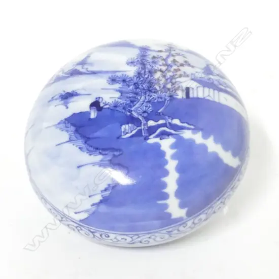 A small porcelain circular box