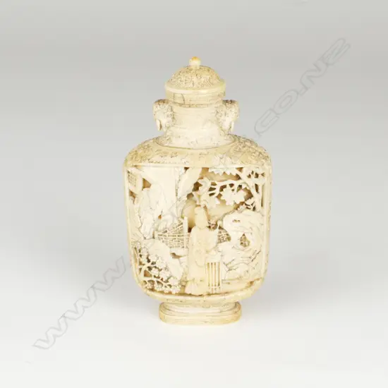 A large old Chinese carved ivory snuff bottle