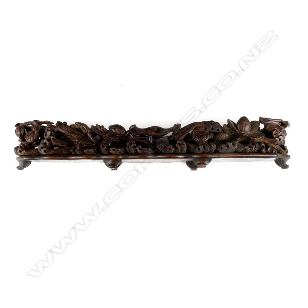 A substantial Chinese Qing period carved ivory tusk depicting the Eight Immortals voyaging to the Feast of Peaches Image 1++