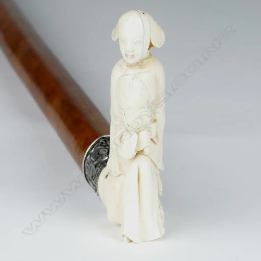 A 19thC Chinese ivory and silver handled walking stick Image 1++