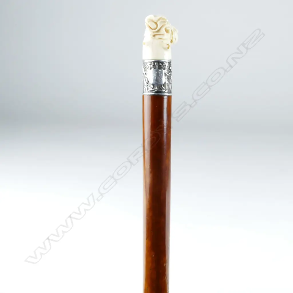 A 19thC Chinese ivory and silver handled walking stick Image 1++