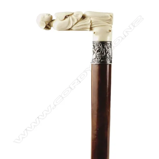 A 19thC Chinese ivory and silver handled walking stick