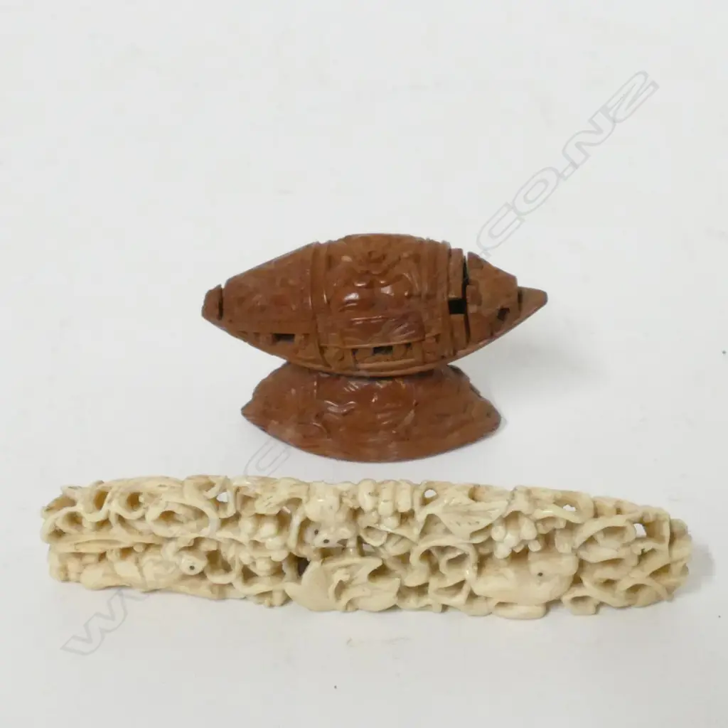 A small delicately carved ivory plaque Image 1++