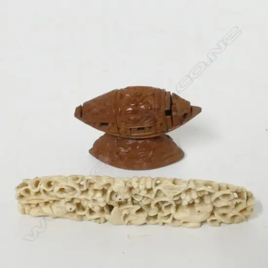 A small delicately carved ivory plaque