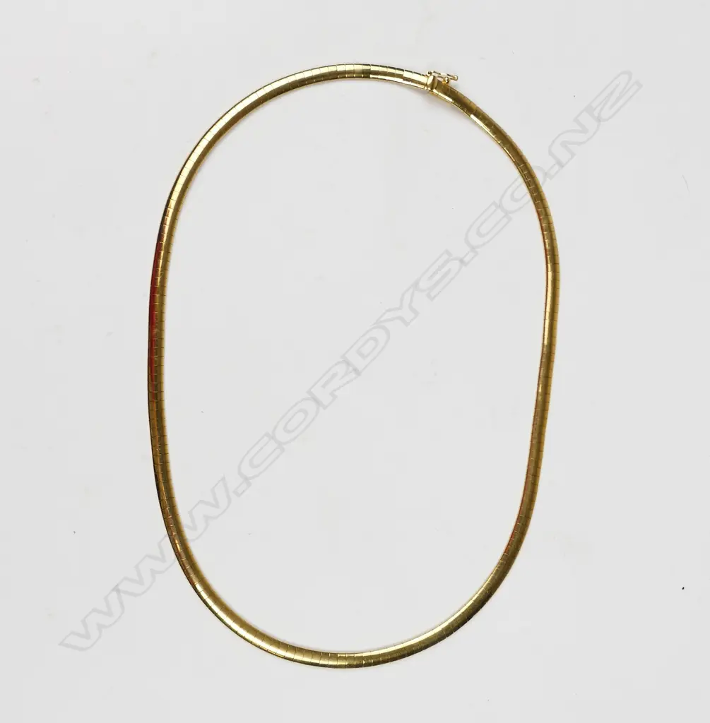 An 18ct. gold necklace Image 1++